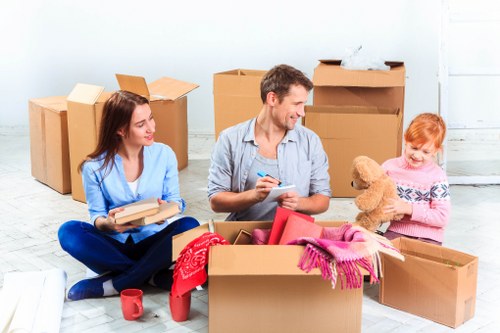 Office relocation planning in Pimlico with moving boxes and desks