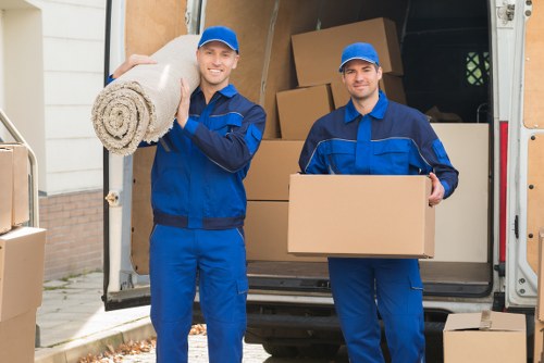 Loading furniture into a moving truck in Pimlico