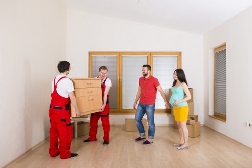 Removal van worker reviewing a customer complaint form