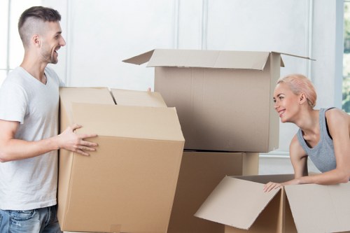 Worker using correct manual handling technique during a move
