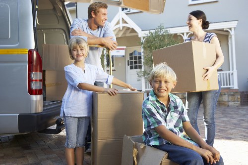 Professional movers handling boxes in Pimlico